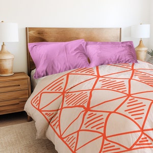 Designer Bed Set with Pink and Red Striped Duvet Cover and Light Blue Checkered Shams
