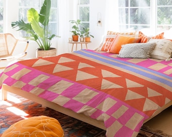 Funda nórdica y fundas de almohada con diseño étnico moderno en rosa y naranja