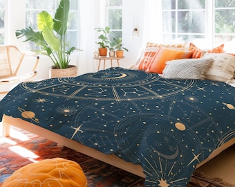 May include: A navy blue duvet cover with a gold celestial design featuring constellations, stars, and a crescent moon. The design is intricate and detailed, creating a whimsical and magical feel.