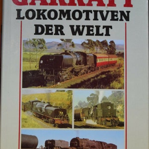 May include: A book cover with the title "Garratt Lokomotiven Der Welt" by A.E. Durrant. The cover features four images of different types of steam locomotives.