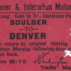 May include: A red ticket for the Denver & Interurban Motor Co. for a return trip from Boulder to Denver. The ticket is valid for one continuous passage and is limited to return to the original starting point not later than Monday following the date of sale stamped on the back. The ticket number is 1499.