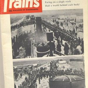 May include: A vintage magazine cover from May 1969 featuring a black and white photograph of two trains facing each other on a single track. The cover text reads "Trains, The Magazine of Railroading" and includes a quote about the engines.