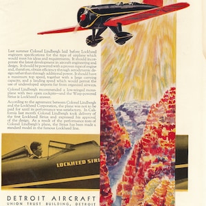 May include: A black and red Lockheed Sirius airplane in flight against a yellow and orange watercolor background. The plane is labeled "Lockheed Sirius" and "N210". The text "A Lockheed for Colonel Lindbergh" is at the top of the image. The text "Lockheed Sirius" is at the bottom of the image. The text "Detroit Aircraft Union Trust Building, Detroit" is at the bottom of the image.