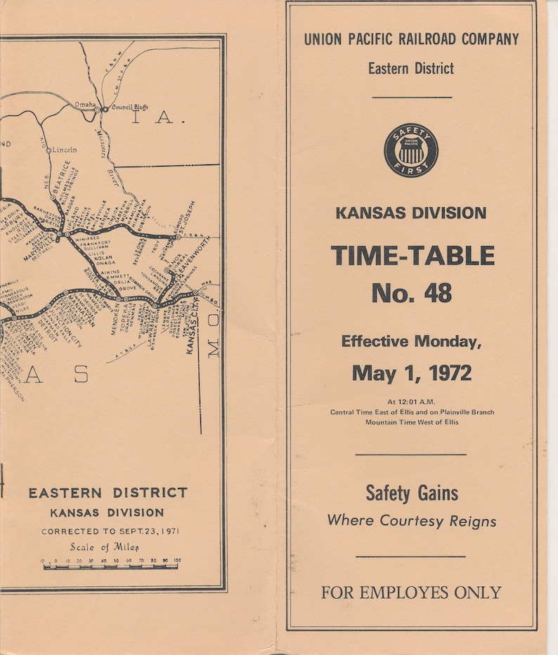 May include: A black and white map of the Union Pacific Railroad Company's Eastern District, Kansas Division. The map shows the railroad lines and stations in the state of Kansas. The text "Time-Table No. 48" is printed in bold at the top of the page. The text "Effective Monday, May 1, 1972" is printed below the time-table number. The text "Safety Gains Where Courtesy Reigns" is printed below the effective date. The text "For Employees Only" is printed at the bottom of the page.