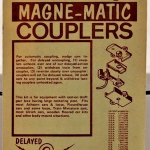 May include: A close-up of a brown and white box with the text "Kadee HO Scale no. 5 Two Pair with draft gear Magne-Matic Couplers" printed on it. The box also includes a description of the product and its features, as well as a list of patent numbers.