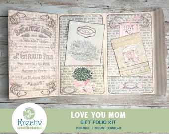 May include: Printable gift folio kit with a vintage aesthetic. The kit features a floral design with the words "Love You Mom" and "Seeds" on the front. The kit is perfect for creating a personalised gift for a loved one.