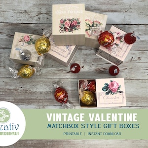 May include: Vintage Valentine matchbox style gift boxes with floral designs and the text "Chocolat" printed on them. The boxes are filled with chocolate candies.
