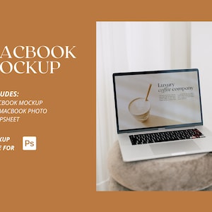 May include: A silver MacBook laptop mockup with a white background. The laptop screen displays a website for a coffee company with the text "Luxury coffee company".