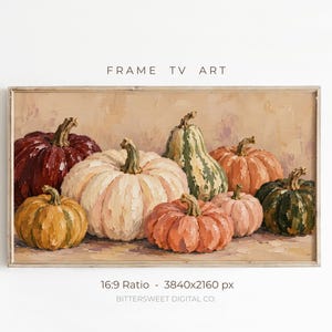 May include: A digital art print for a Frame TV featuring a still life painting of various pumpkins in shades of deep red, cream, orange, green, and muted pink. The text "FRAME TV ART" and "16:9 Ratio - 3840x2160 px BITTERSWEET DIGITAL CO." is visible.