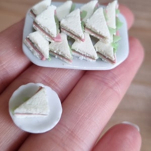 Miniature platter of ham sandwiches