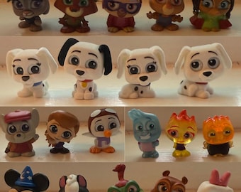 May include: A collection of 20 small plastic figurines of Disney characters. The characters include Mickey Mouse, Minnie Mouse,  a Dalmatian, a skunk, a crocodile, a  rabbit, a fox, a  owl, a  mouse, a  dog, a  bird, a  firefighter, a  police officer, and a  princess. The figurines are all about 2 inches tall and are painted in bright colors.
