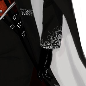 May include: A black jacket with a white floral design on the sleeve. The jacket has a silver buckle detail on the front.