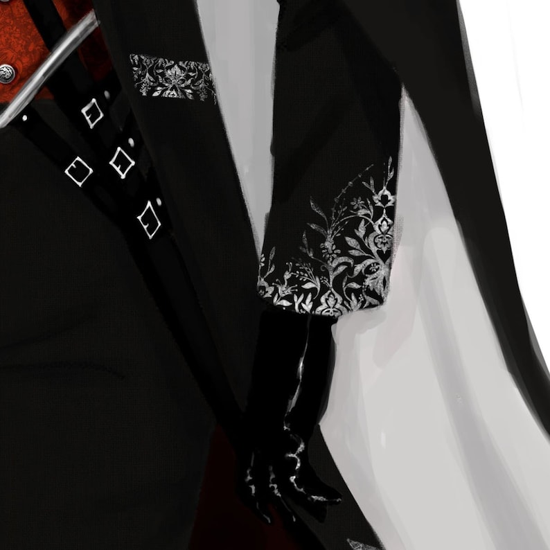 May include: A black jacket with a white floral design on the sleeve. The jacket has a silver buckle detail on the front.