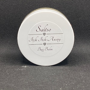 May include: White jar with a black label that reads "Saltso Itch Itch Away Bug Balm" with a heart symbol between each word.