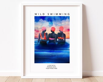 May include: A watercolour painting of three women in pink swimming caps and swimsuits, sitting in the water. The sky is a vibrant orange and pink, and the water is a deep blue. The text "WILD SWIMMING" is at the top of the image, and the text "A DIP WITH FRIENDS SETS YOUR MIND FREE" is at the bottom.