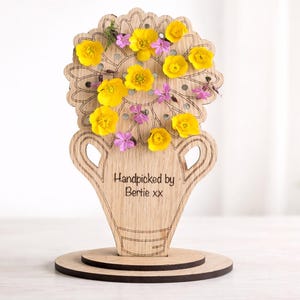 Personalised wooden flower holder with real yellow and pink flowers, engraved “Handpicked by Bertie xx”, freestanding Mother’s Day gift for Mum or Nana