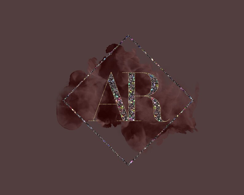 May include: A gold diamond frame with a glittery gold "AR" monogram on a dark red watercolor background.