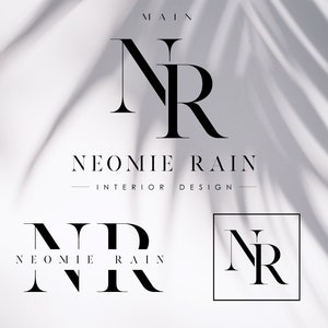 May include: Black and white logo design for Neomie Rain Interior Design. The logo features the letters "NR" in a stylized font.