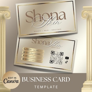 Puede incluir: Dos tarjetas de visita con borde dorado y fondo beige degradado. Las tarjetas presentan el nombre "Shona Skin" en escritura elegante, con informaci&oacute;n de contacto y redes sociales. Tambi&eacute;n se ven las palabras "Beauty, Hair, Boutique".