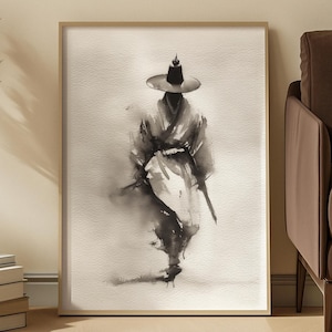 Op de afbeelding: Een witte keramische mok met een zwart handvat en de tekst "But First, Coffee" in een zwarte, vette letter. De mok staat op een houten oppervlak. De mok is ongeveer 10 cm hoog.