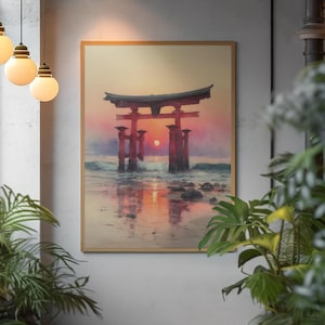 May include: Framed artwork depicting a Japanese torii gate at sunset. The gate is red, set against a vibrant sky of orange and pink hues. The artwork captures the gate's reflection in the water, creating a serene and picturesque scene.