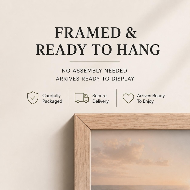 May include: A light wood picture frame with a partial view of a landscape print. Text reads: FRAMED & READY TO HANG, NO ASSEMBLY NEEDED, ARRIVES READY TO DISPLAY, Carefully Packaged, Secure Delivery, Arrives Ready To Enjoy with icons.