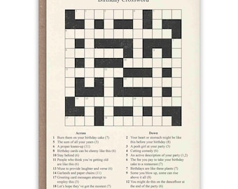 May include: A birthday crossword puzzle card with a brown border. The crossword grid is black on a cream background, with clues listed below. The title "Birthday Crossword" is at the top. A unique birthday card.