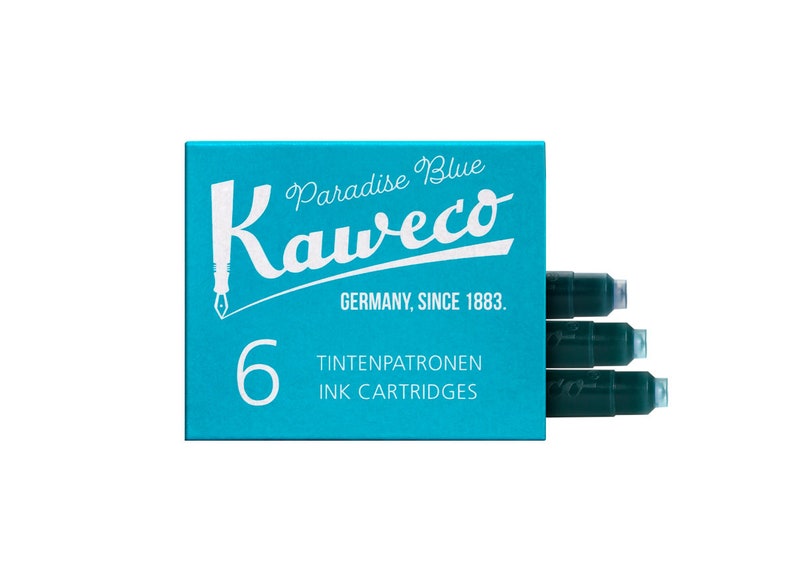 May include: A teal box of Kaweco Paradise Blue ink cartridges. The box features the Kaweco logo and the text "GERMANY, SINCE 1883." The box contains six ink cartridges, with the words "TINTENPATRONEN INK CARTRIDGES" printed on the front.