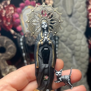 Santa Muerte with cat