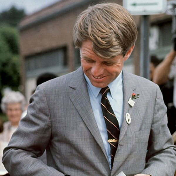 1968 ROBERT F KENNEDY Signing a Poster During a Campaign 7.7X10.5 Image Size Photo