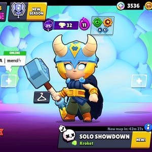 May include: A mobile game interface with a cartoon character holding a hammer. The character is wearing a helmet and cape. The screen shows game options, player stats, and the text "SOLO SHOWDOWN".