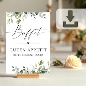Könnte beinhalten: Ein weißes Schild mit grünen Aquarellblättern und dem Text "Buffet" in schwarzer Kursivschrift. Unter dem Text befindet sich ein kleines schwarzes Herz und der Text "Guten Appetit" in Schwarz. Darunter steht der Text "Bitte bedient euch!" in Schwarz.