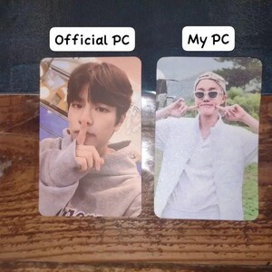 May include: Two rectangular photo cards placed side by side. The left card is labeled Official PC and shows a person in a grey hoodie making a shushing gesture. The right card is labeled My PC and shows a person in a white outfit and sunglasses.