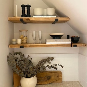 Reclaimed solid wood shelves with steel brackets
