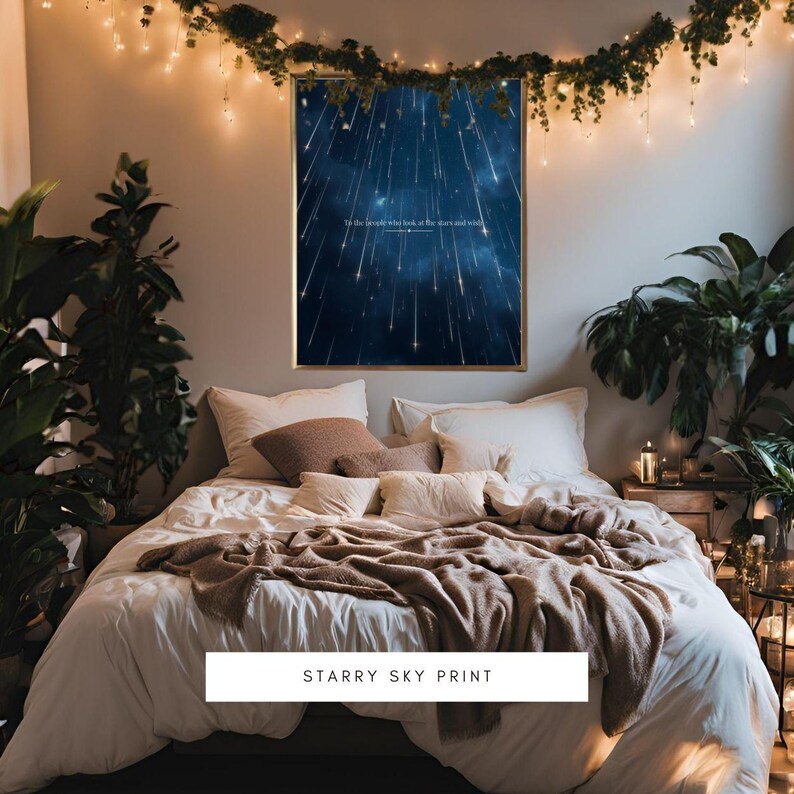 May include: A white bed with a brown blanket and pillows, with a framed print of a starry night sky above the bed. The print has the text "To the people who look back at the stars and wish..." The text "Starry Sky Print" is below the bed.