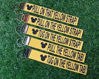 Pull The Yellow Strap Keychain|Theme Park Inspired Keychain