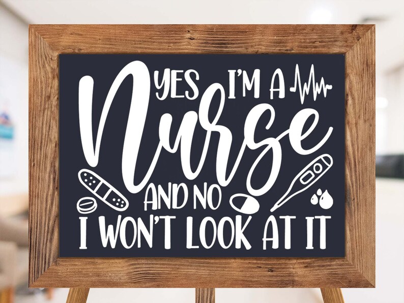 May include: A black chalkboard sign with white text that reads "Yes I'm a Nurse and no I won't look at it". The sign is framed in a brown wooden frame and is sitting on a wooden easel. There are medical symbols on the sign, including a bandage, a pill, a thermometer, and blood drops.