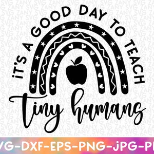 May include: Black and white graphic design featuring a rainbow, apple, and the text "It's a good day to teach tiny humans".