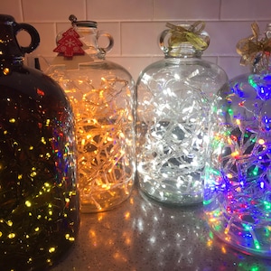 Gorgeous Re-loved Clear and Brown Glass Demijohn Lamps using LED Fairy Lights