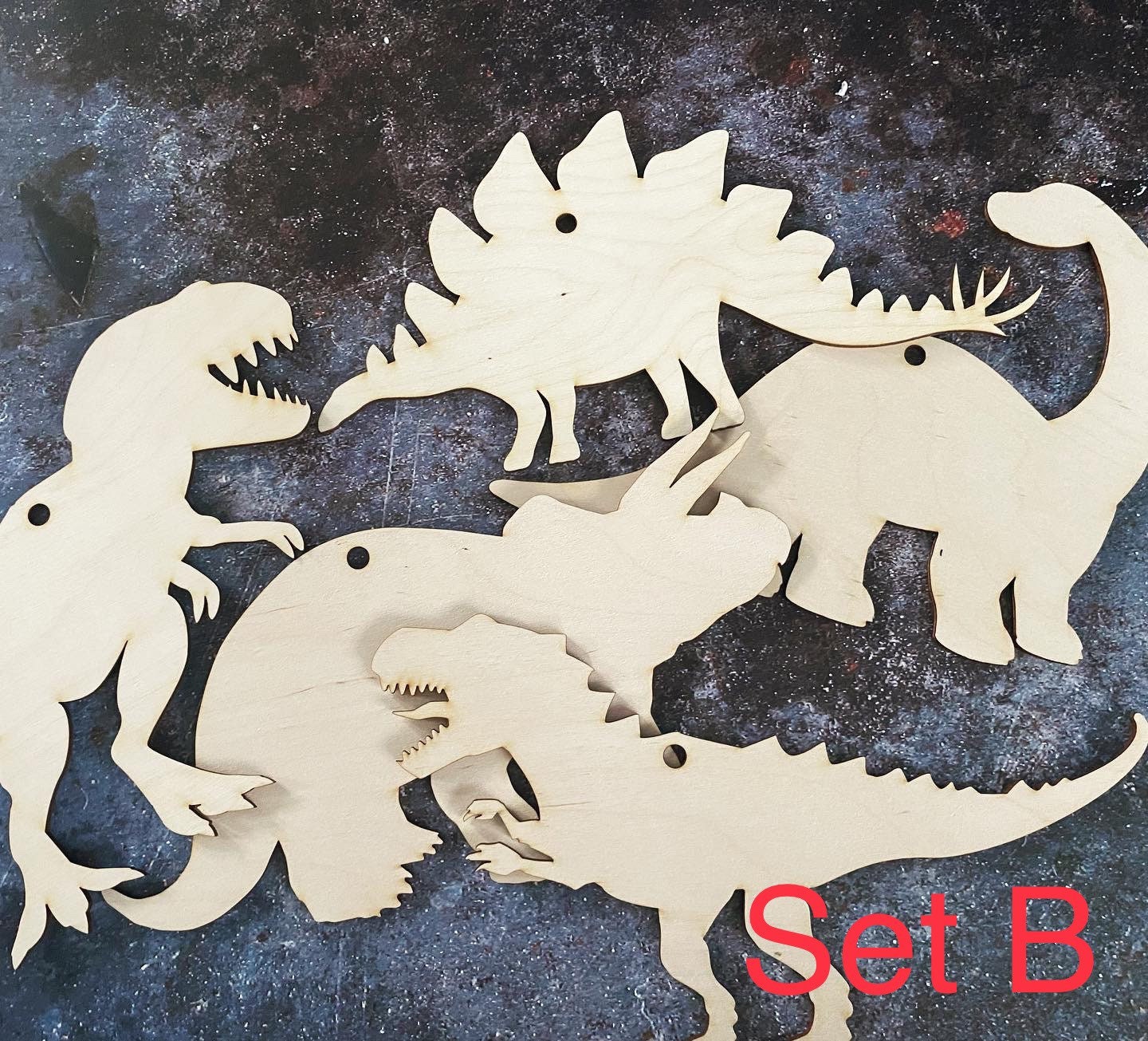 painted wood dinosaur cut outs