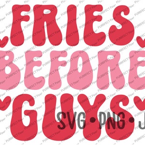 May include: Red, pink, and white graphic text that reads "Fries Before Guys" with hearts on either side of the text. The text is in a retro, bubble-like font.