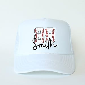 a white hat with a baseball design on it