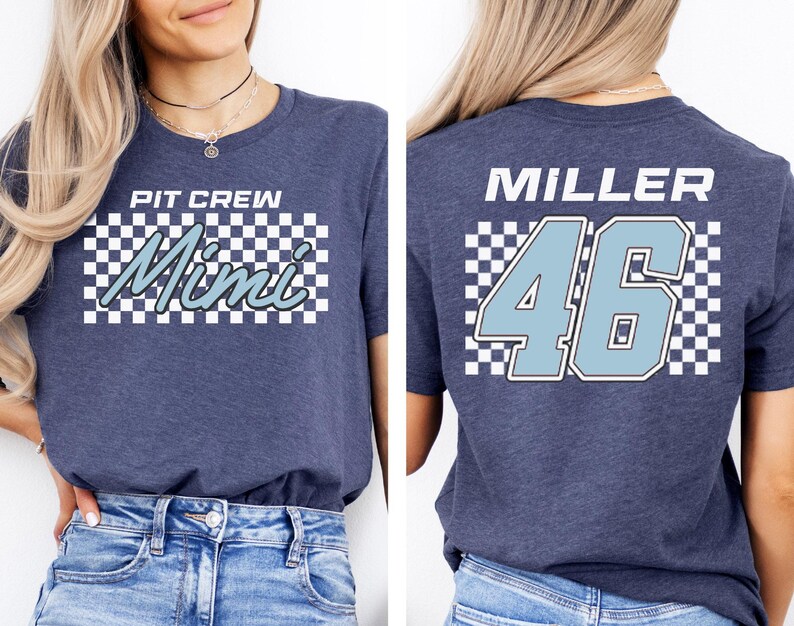 A woman wearing a gray t-shirt with the text "PIT CREW Mimi 46" printed on it.