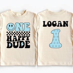 two t - shirts that say, one logn happy dude and one logn