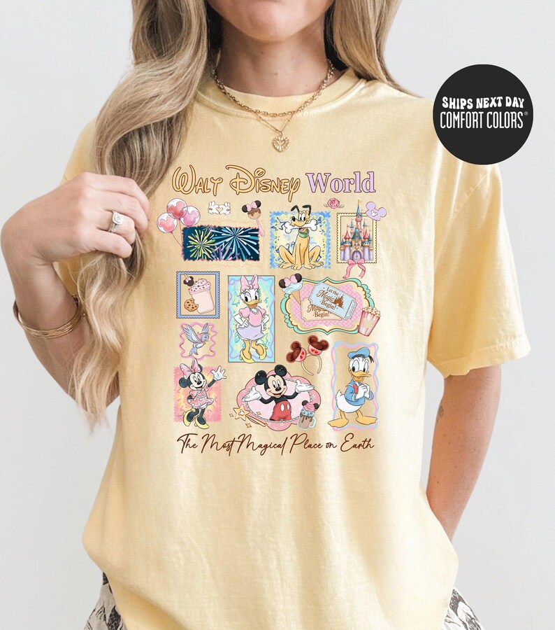 A person wearing a yellow t-shirt with a collage of Disney characters and the text "Walt Disney World" printed on it.
