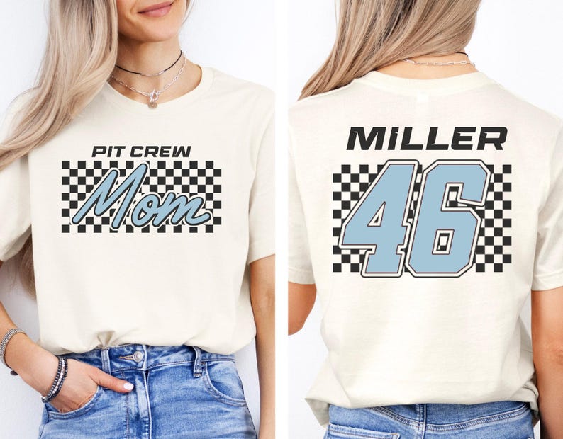 A woman wearing a white t-shirt with a checkered pattern and the text "PIT CREW Mom" printed on it.