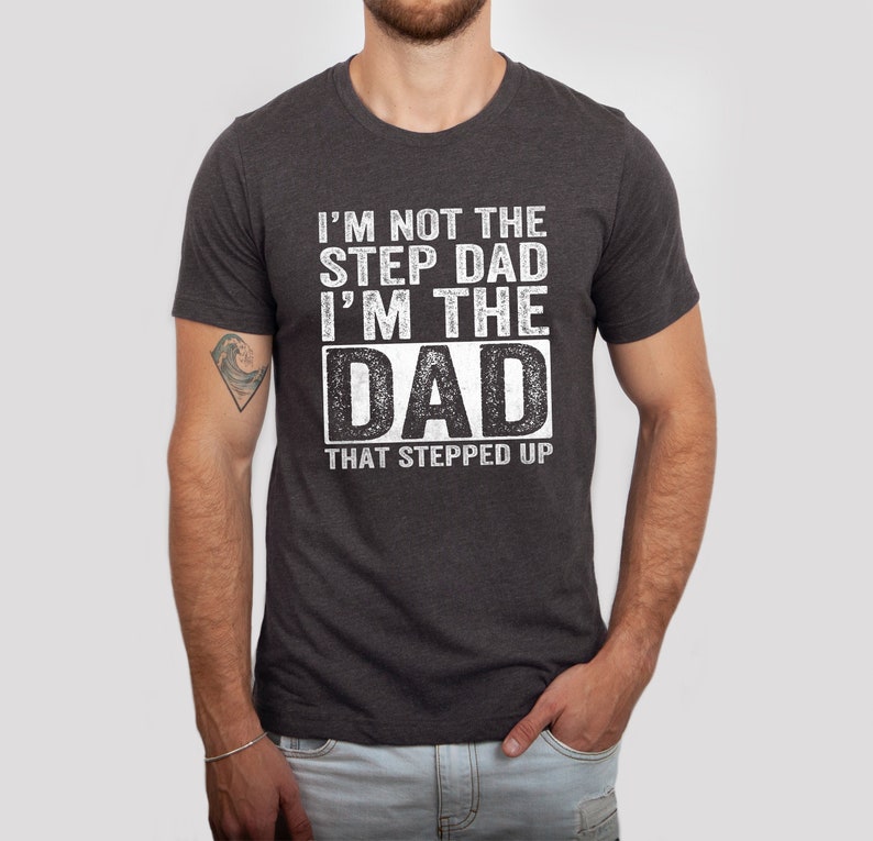 a man wearing a t - shirt that says i'm not the step dad