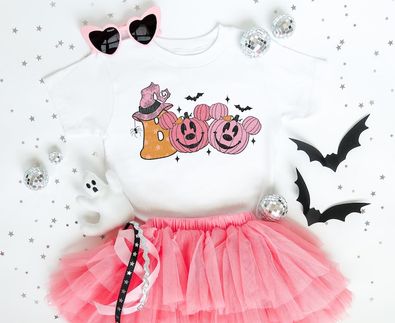 a white shirt with pink tutu and a pink tutu skirt