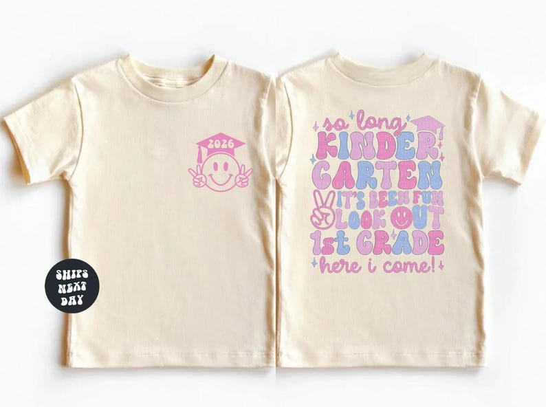 two white t-shirts with colorful text and graphics on them.