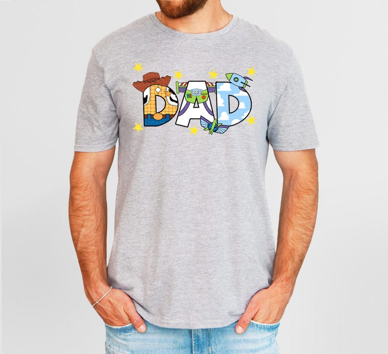 a man with a beard wearing a t - shirt that says dad